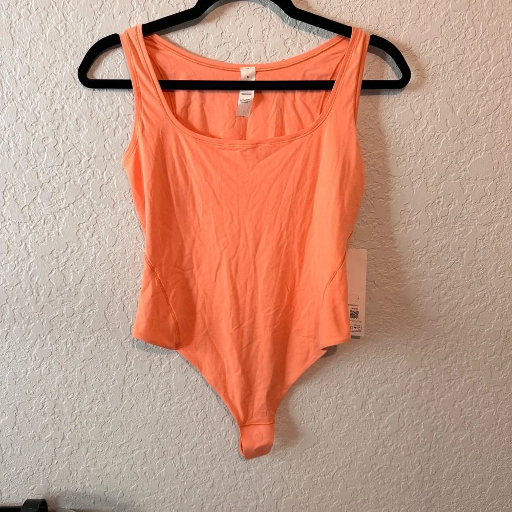 Lululemon Wundermost Square-Neck Bodysuit M Orange Peach NWT
